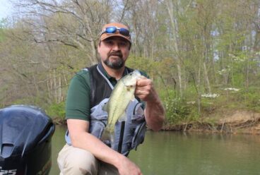 Photo of Rich Zweifel with a largemouth bass.